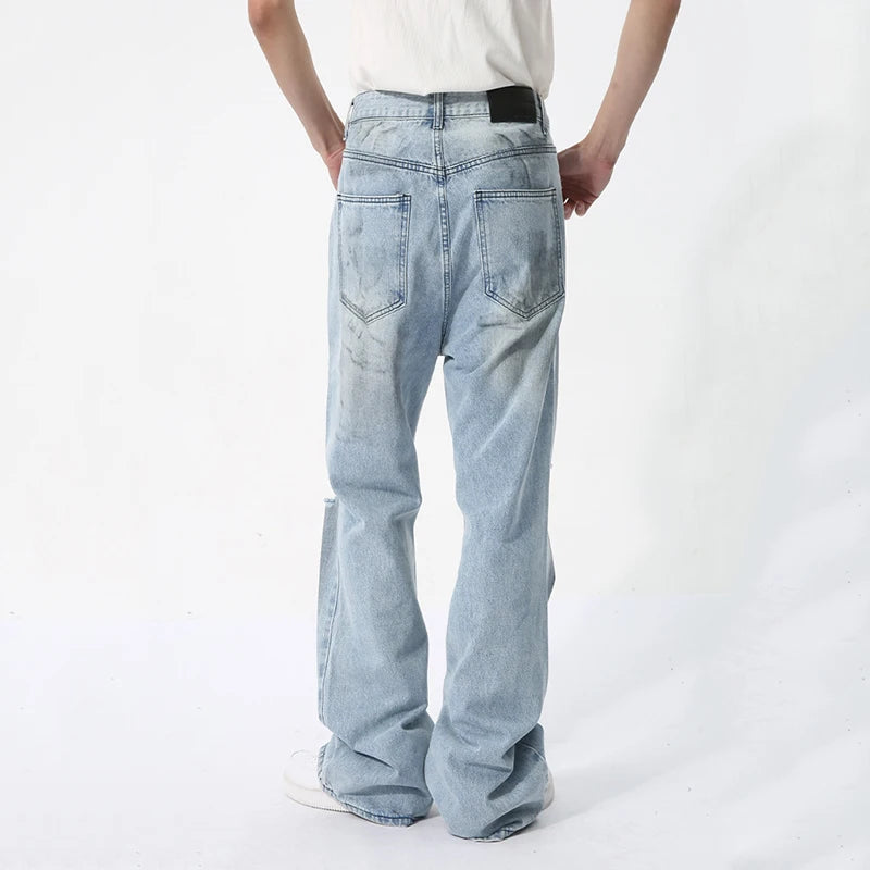 Ripped Loose Fit Washed Denim Jeans