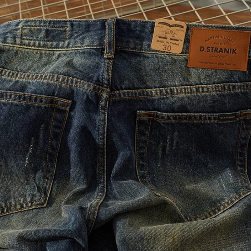 Washed Distressed Tappered Leg Jeans