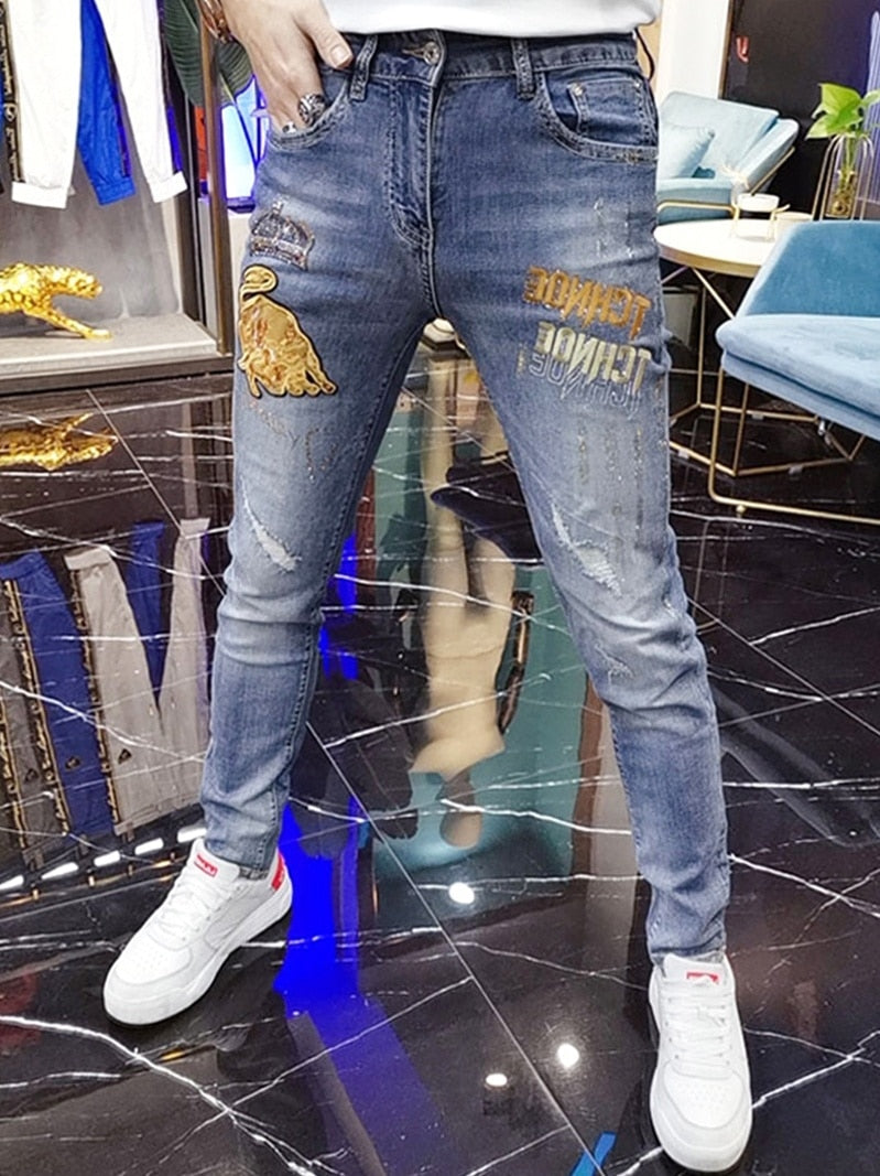 Taurus Badge Embroidery Decorated Blue Jeans