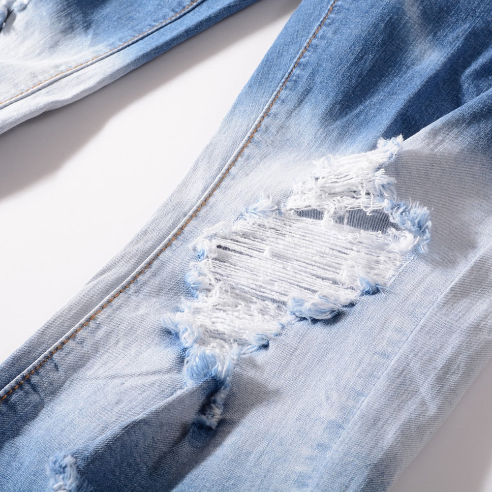 Light Blue Holes and Patchwork Decorated Jeans