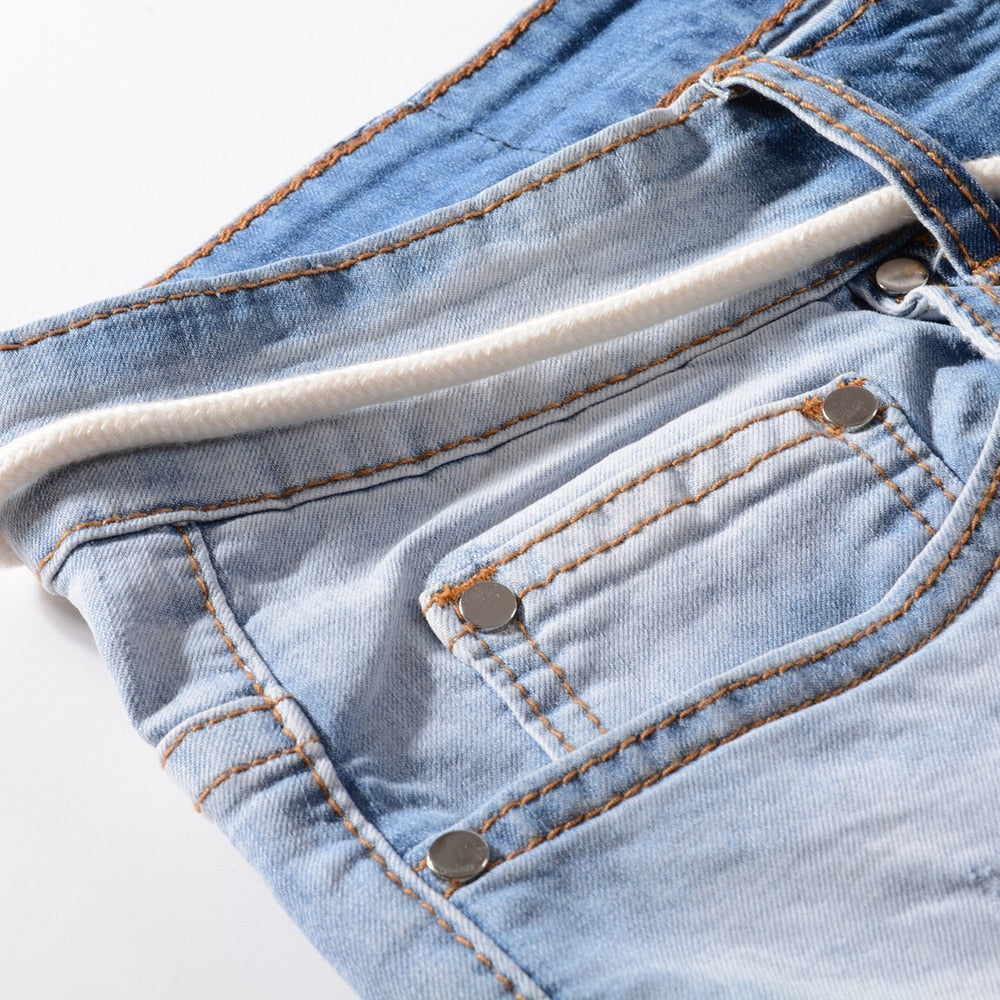 Light Blue Holes and Patchwork Decorated Jeans