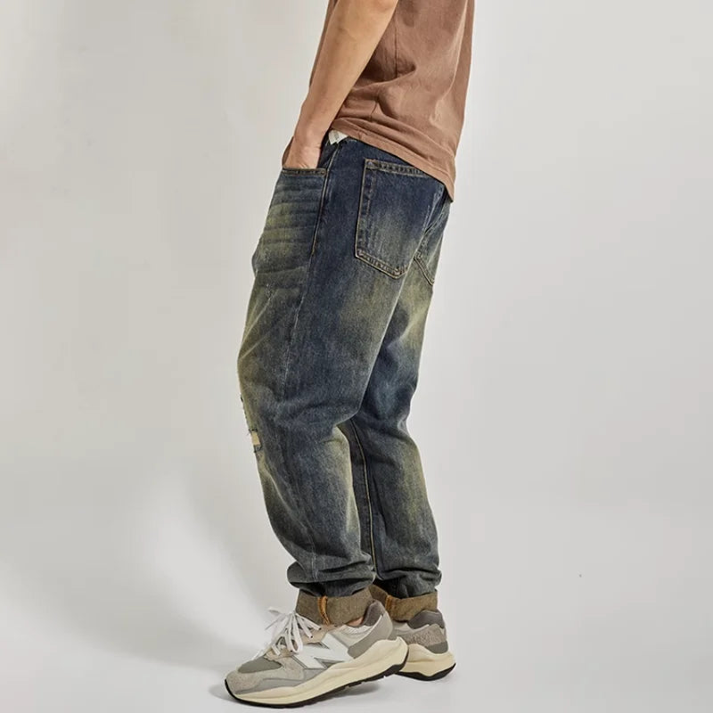 Washed Distressed Tappered Leg Jeans